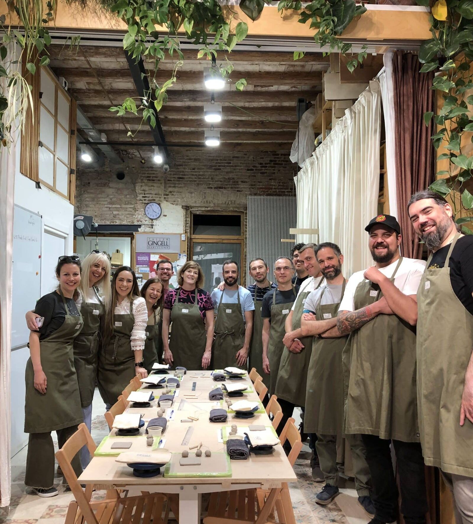 Communal hands-on craft masterclass, aprons on