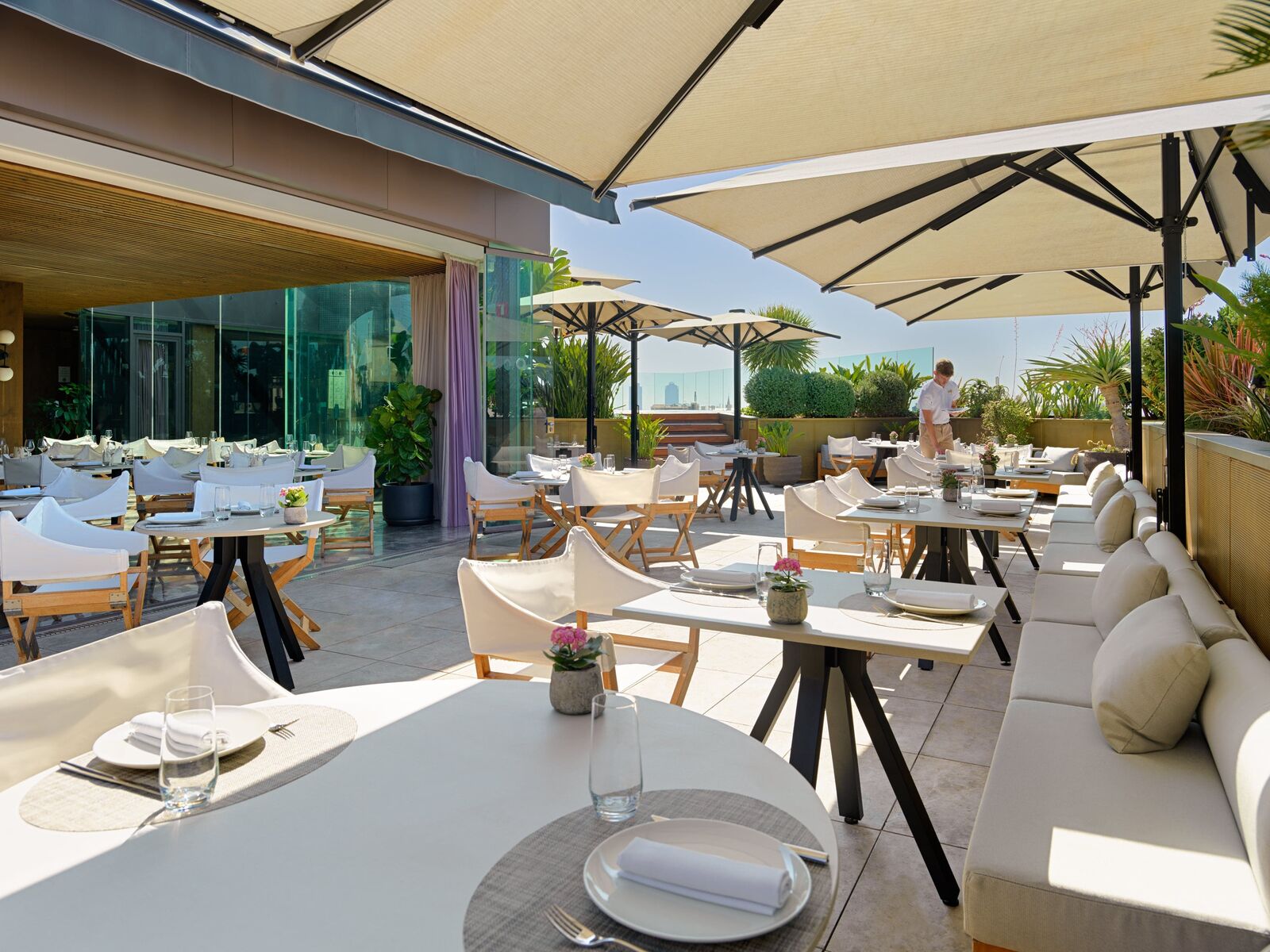 Private rooftop terrace dining with Barcelona skyline views